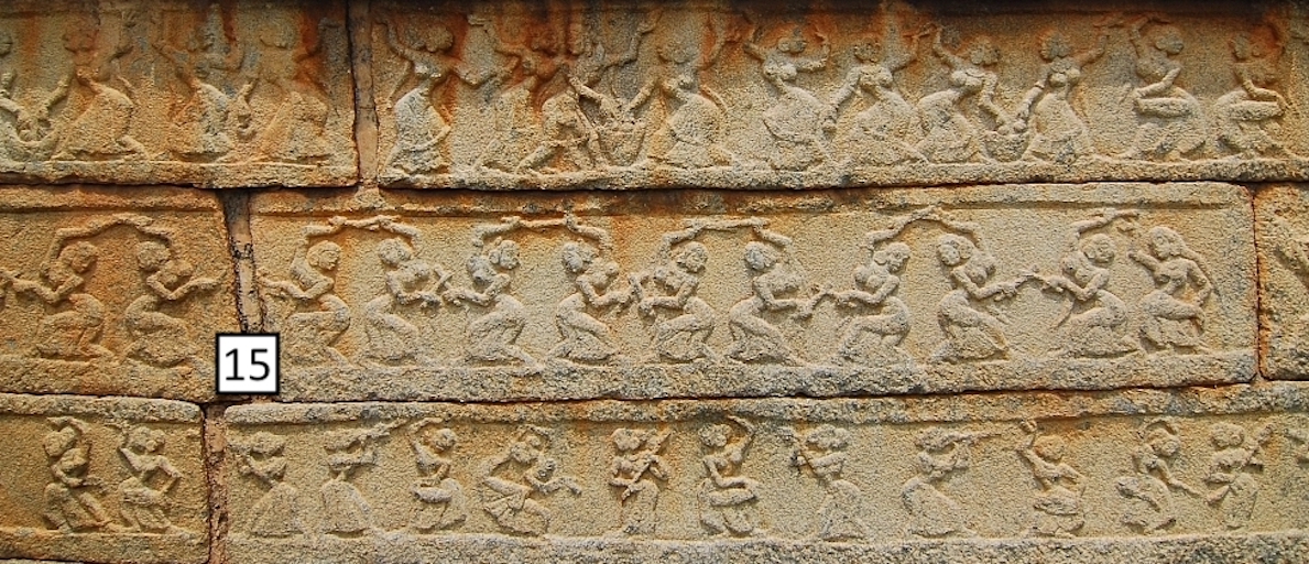 stone frieze with rows of dancing women