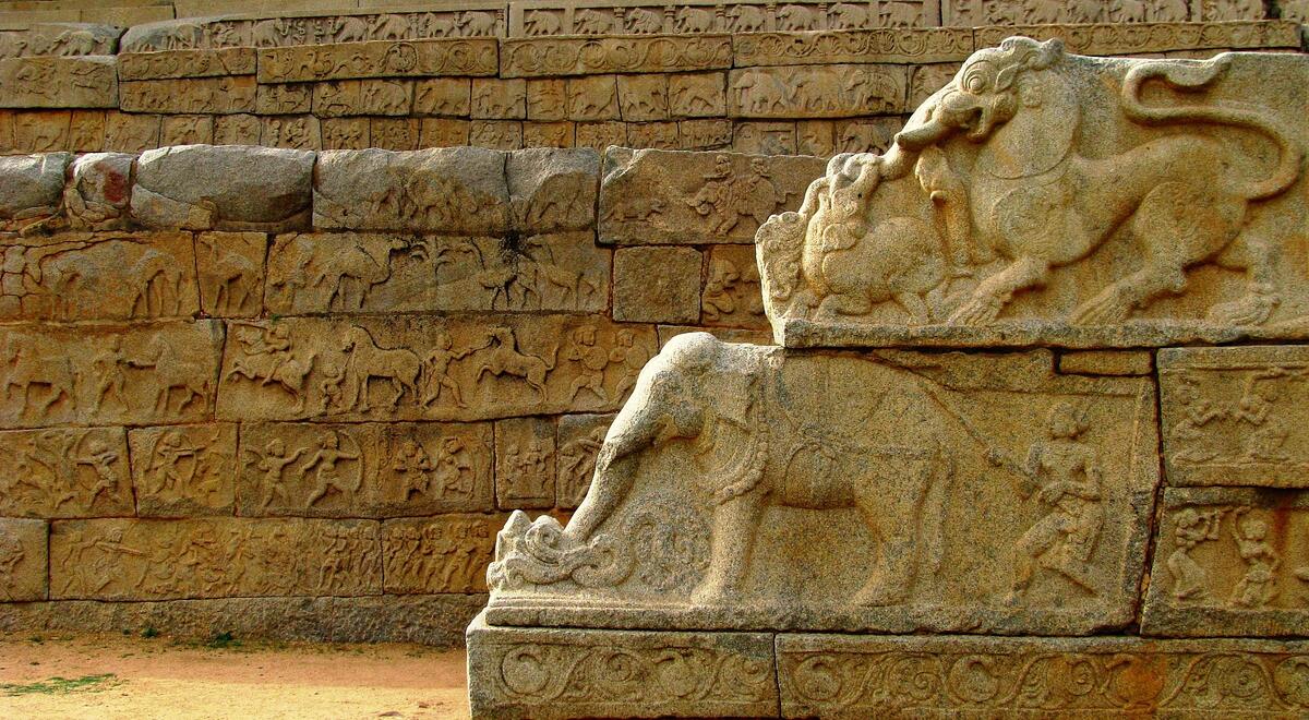 detail of stone carvings showing large elephant and many other creatures