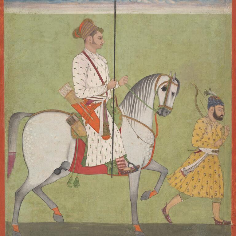 man on horse holding lance, man with bow walking ahead of him