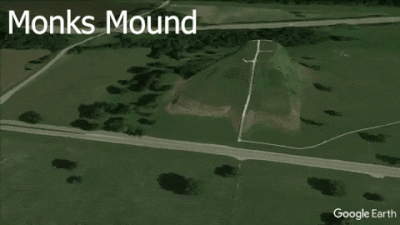 Cahokia flyover of monks-mound, grass and trees, with large rectangular hill and smaller round hills