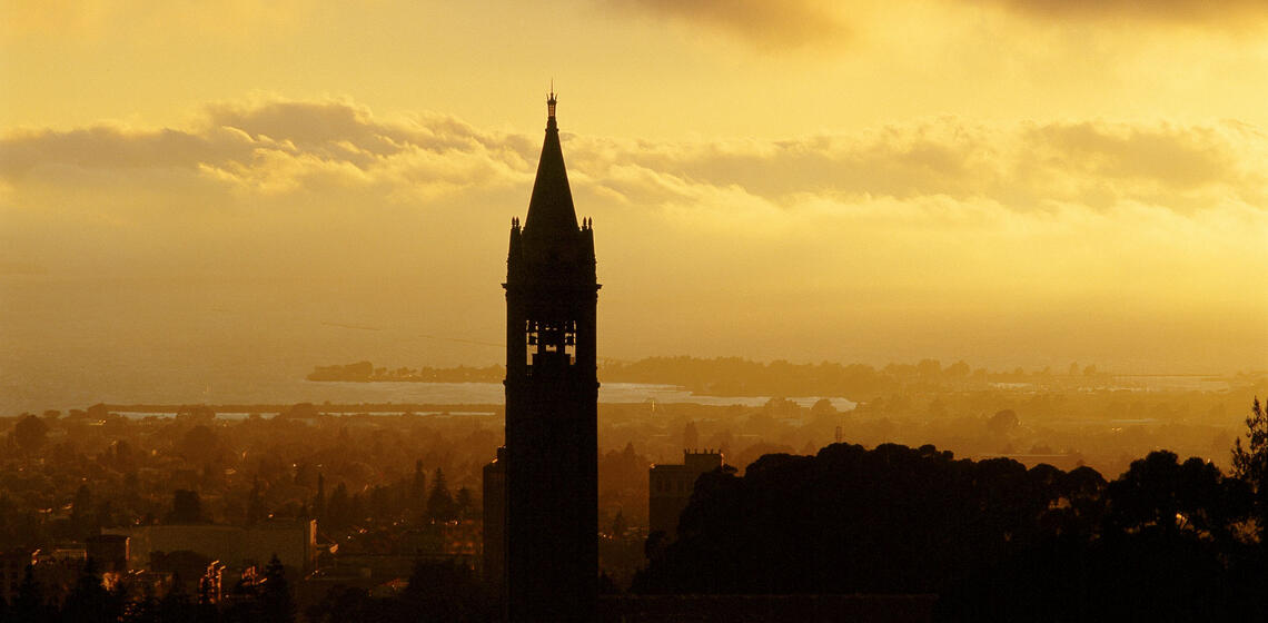 Berkeley bell tower silhouetted against sunset
